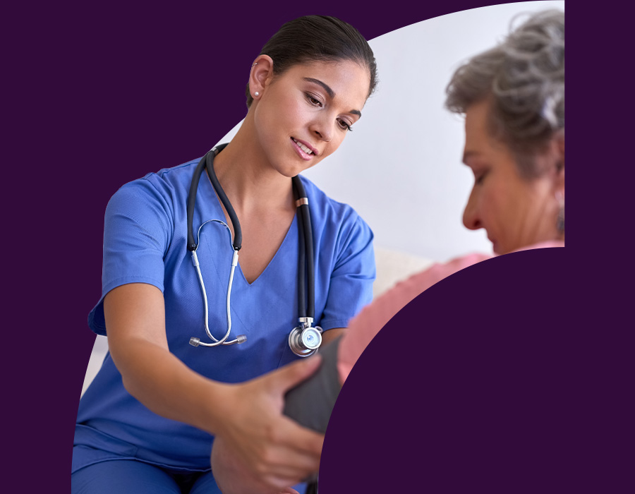 Nurse taking patient's blood pressure