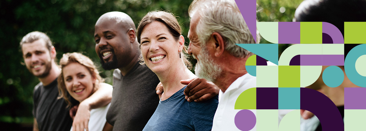 A group of people standing shoulder to shoulder