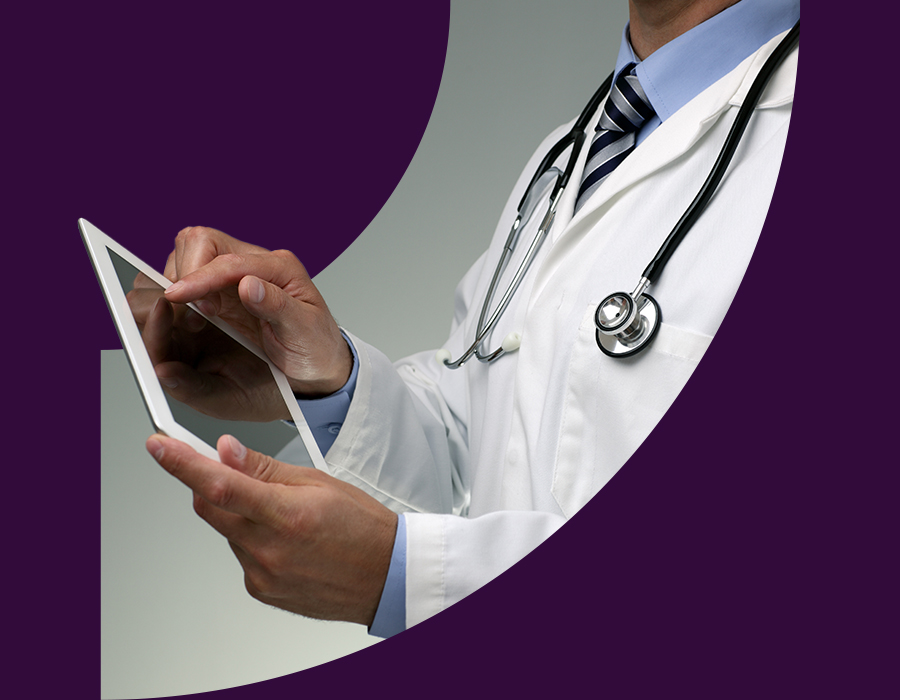 Doctor checking heath data on a tablet device