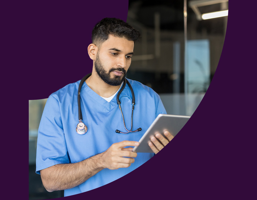 Doctor reviewing health data on a tablet