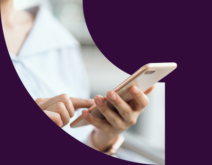 Woman using a mobile phone to dial a number