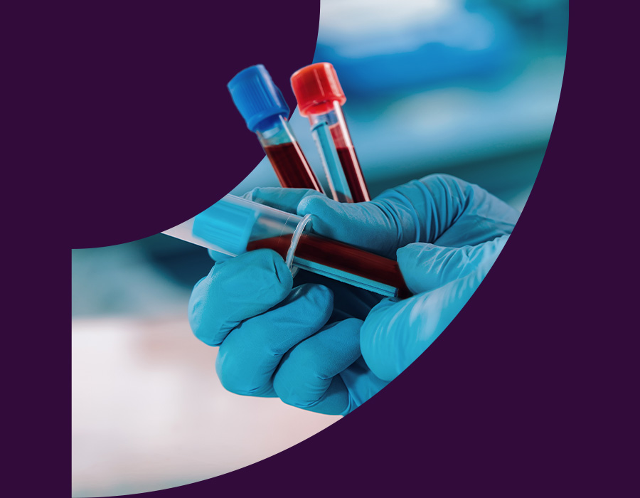 Nurse collecting blood sample from a patient