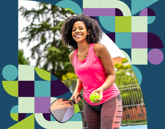 Young black woman playing pickle ball