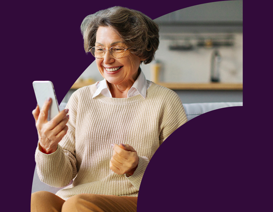 Patient uses phone to conduct a telemedicine visit with her doctor